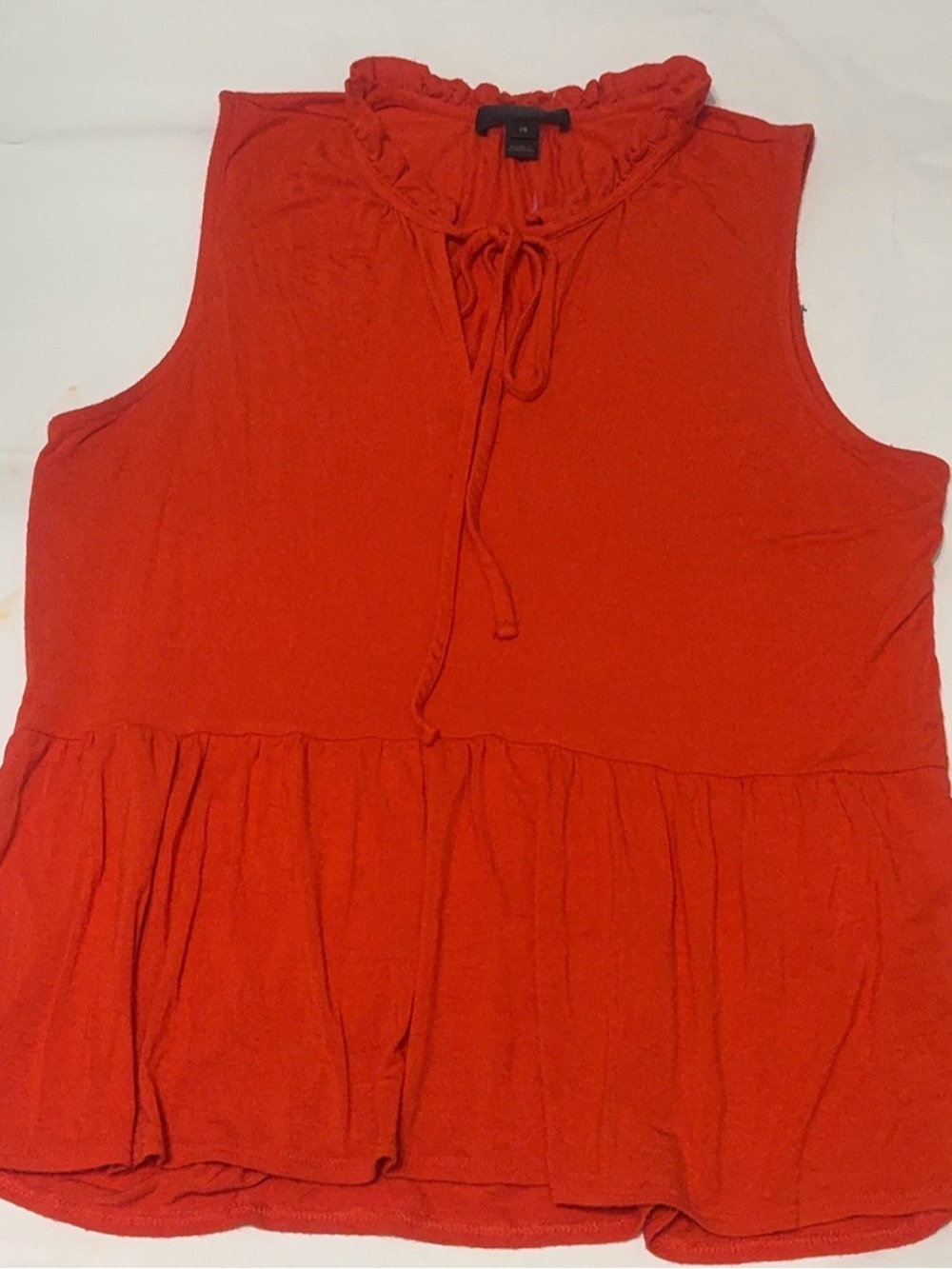 J. Crew Sleeveless Ruffle-Tie Peplum Top in orange-red